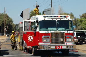 Fire men on a firetruck