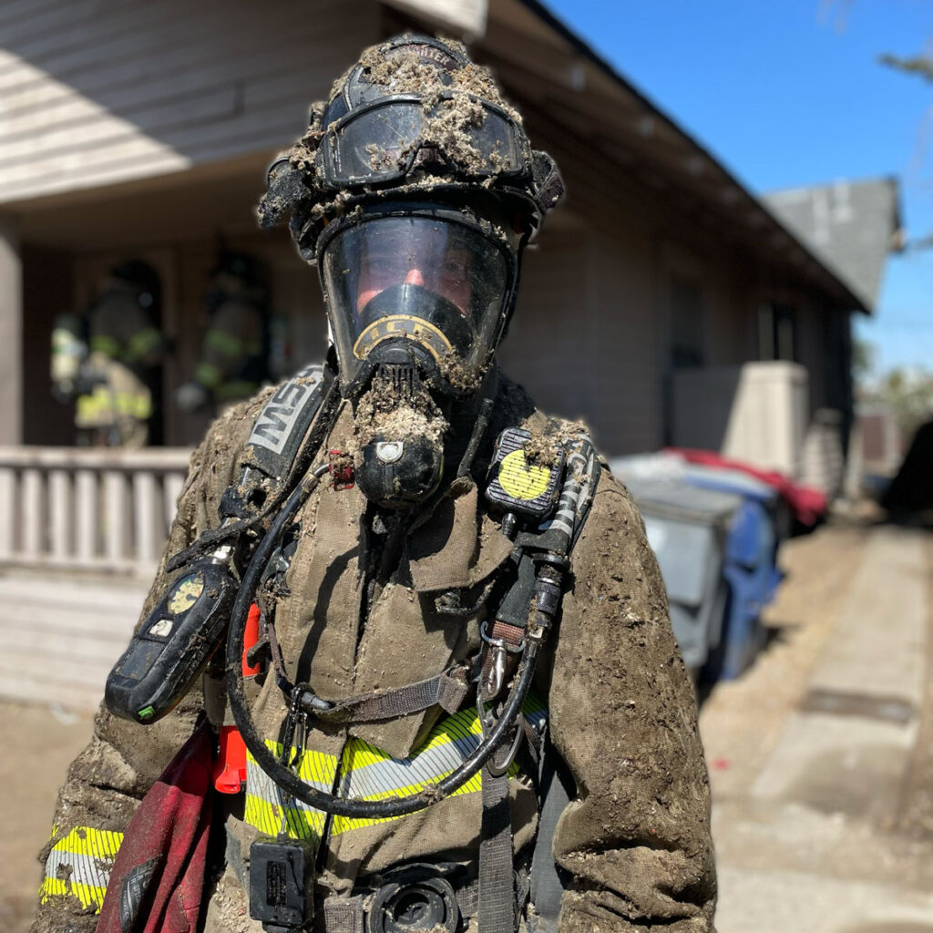 Firefighter After Overhauling Residential Structure Fire