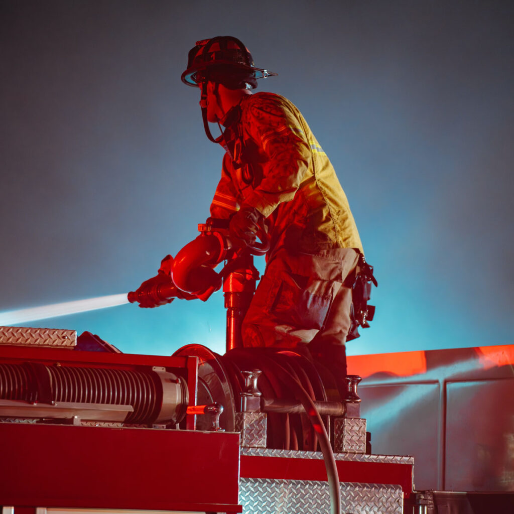 Firefighter Operating Deck Gun
