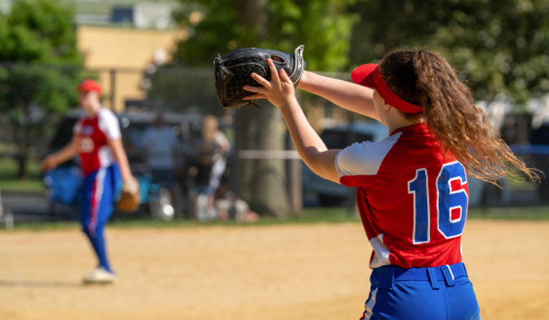 Girl playing baseball at Granite Park